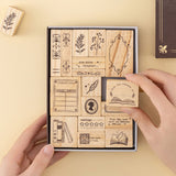 Hand taking out ‘from the library of’ rubber stamp from Our Stories stamp set