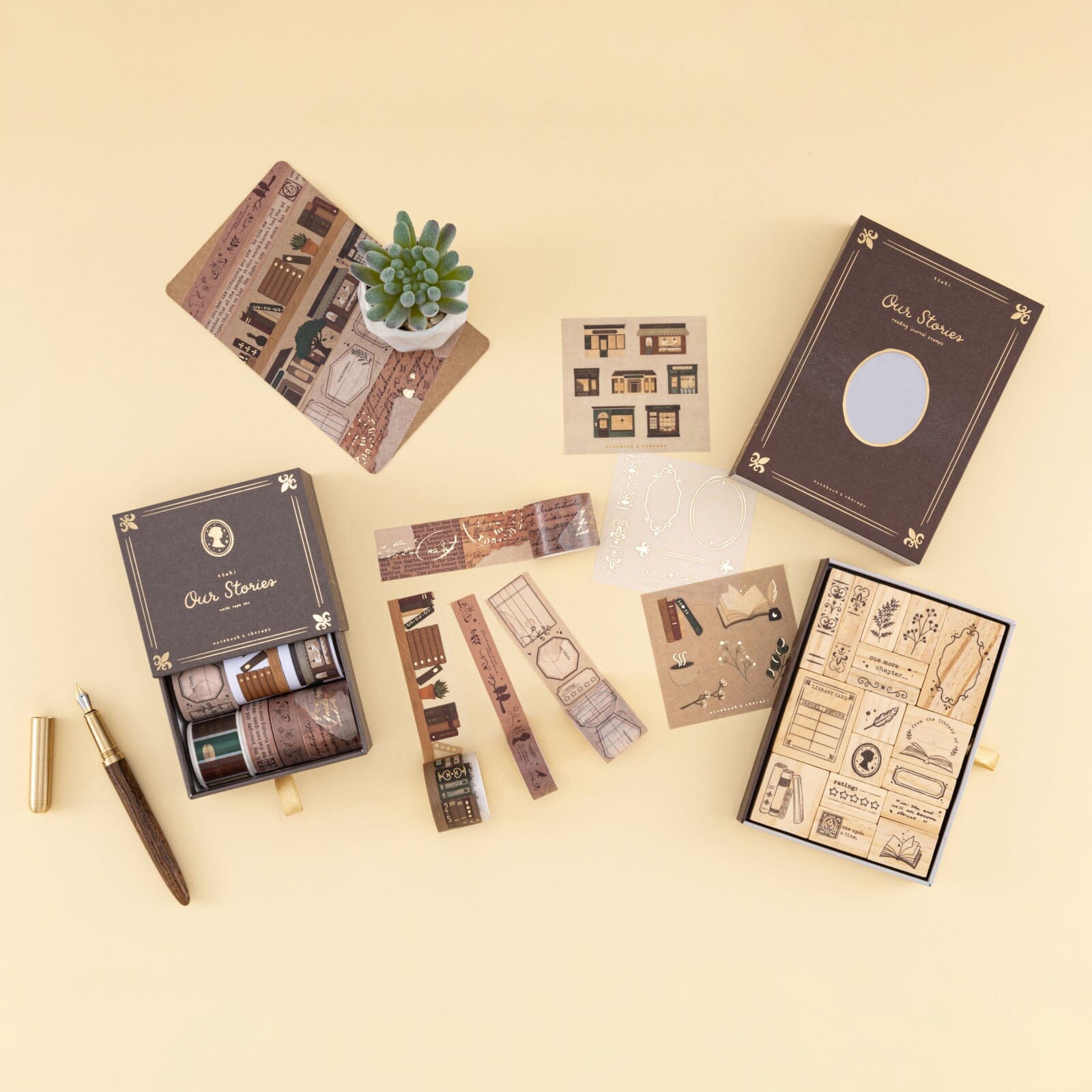 Flatlay of Our Stories collection with washi tape set and stamps