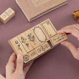 Tsuki ‘Vintage Rose’ Bullet Journal Stamp Set held in hands in mauve background
