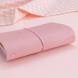 Spine of Tsuki ‘Sakura Journey’ Limited Edition Travel Notebook with pink gingham in pink background