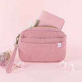 Tsuki ‘Sakura Journey’ Limited Edition Travel Notebook inside Tsuki ‘Sakura Journey’ Travel Pouch with micron pen with Tsuki ‘Sakura Journey’ Vintage Journal Washi Tapes with cherry blossoms in pink background