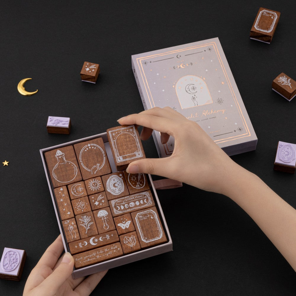 Hands holding Tsuki ‘Moonlit Alchemy’ Bullet Journal Stamp Set 
