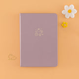 Tsuki Blush Pink ‘Bunny Blush’ Limited Edition Bullet Journal designed with Blossom Bujo with with free paper clip and felt flowers on apricot background