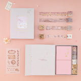 Flatlay of Tsuki Sakura Breeze travel notebook gift set by Notebook Therapy