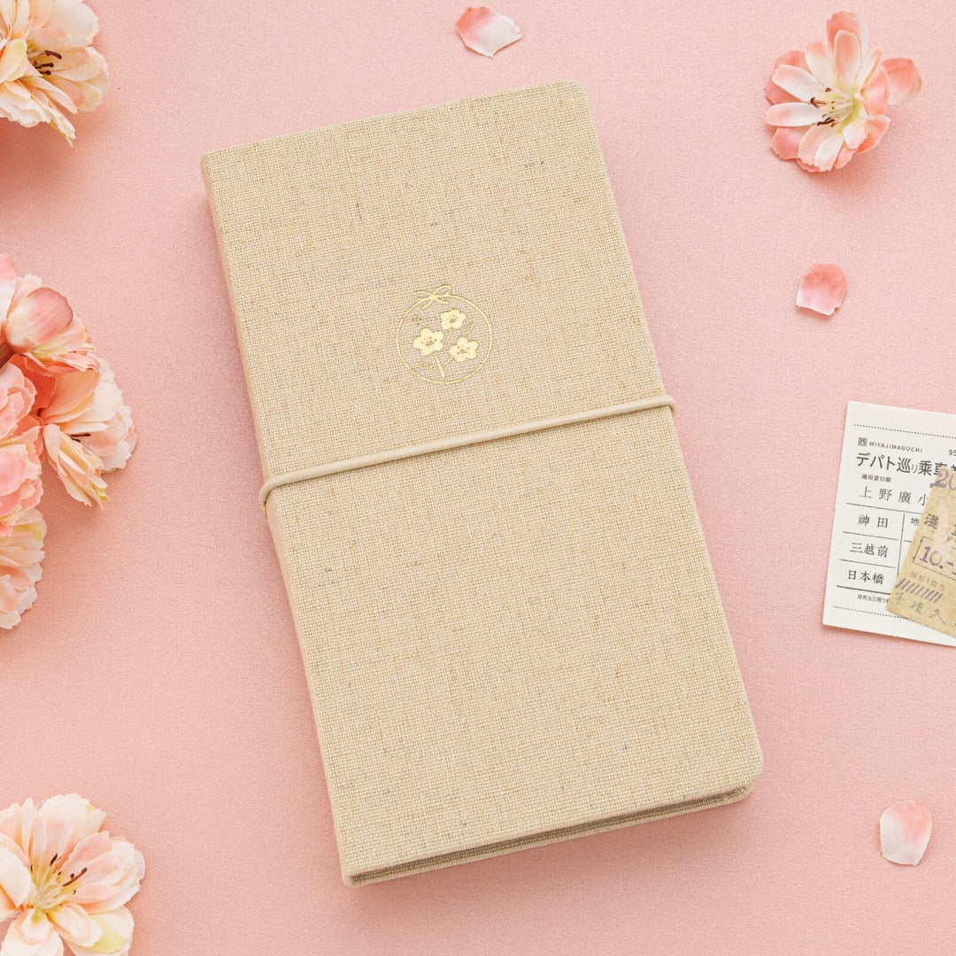 Beige linen kraft paper travel notebook with sakura gold foil icon