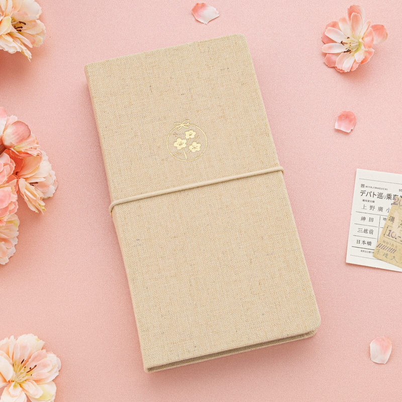 Beige linen kraft paper travel notebook with sakura gold foil icon