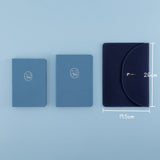 Flatlay of Tsuki Cloud Dreamland notebook pouch with 2 Tsuki Nami notebooks in original size and A5 