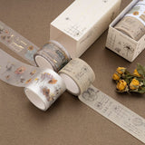Washi tape rolls on brown background