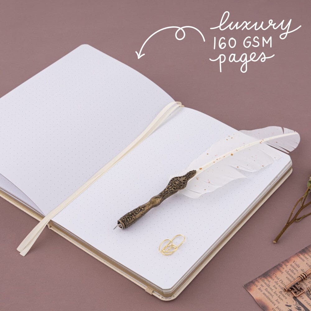 Opened bullet journal with text “luxury 160gsm pages”