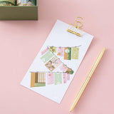 Tsuki ‘Matcha Ichigo’ Washi Tape Set on clipboard with gold pen on light pink background
