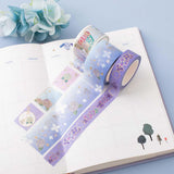 Close up of Tsuki Endless Summer Washi Tape Set on open bullet journal page with light blue hydrangea flowers on light blue background