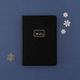 Tsuki ‘Winter Journey’ Limited Edition Bullet Journal with free paperclip gift and snowflakes on navy background