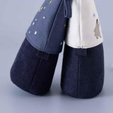 Tsuki ‘Dreams of Snow’ Pop-Up Pencil Cases in Starry Night and Playful Penguin in light blue background