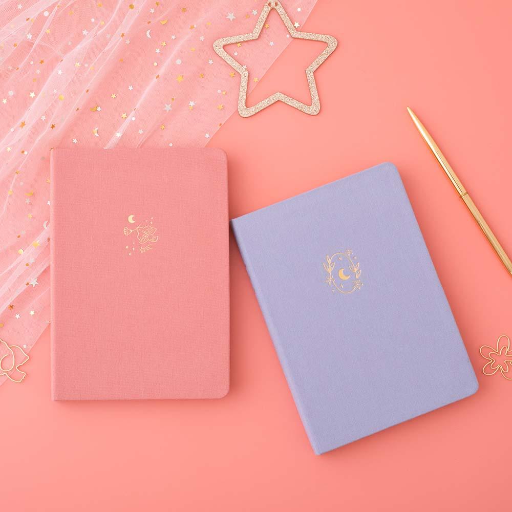 Tsuki ‘Full Bloom’ Limited Edition Bullet Journal with Tsuki ‘Suzume’ Limited Edition Notebook with free gifts and pen with netting on coral pink background