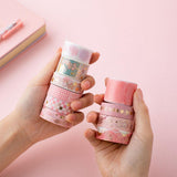 Tsuki 'Sakura Edition' Washi Tape Set held in hands over light pink background