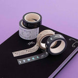 Tsuki ‘Moonlit Spell’ Washi Tape Set on Tsuki ‘Moonlit Spell’ Limited Edition Holographic Bullet Journal on purple background