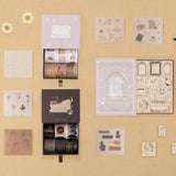 Tsuki Academia collection flatlay including Dark Academia washi tape set, Light Academia bullet journal stamp set, Light Academia washi tape set