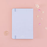 Back cover of Tsuki ‘Sakura Journey’ Limited Edition Bullet Journal with free bookmark gift with cherry blossom petals on pink background