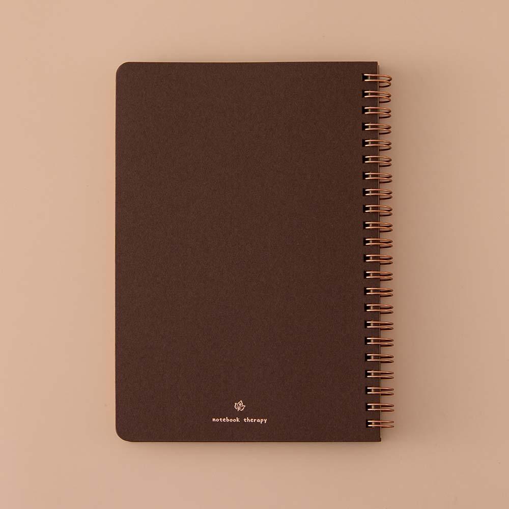Back page cover of Tsuki ‘Maple Dreams’ Kraft Paper Ringbound Bullet Journal on beige background