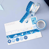 Tsuki ‘Cup of Galaxy’ Washi Tapes on postcard with bunting on light blue background
