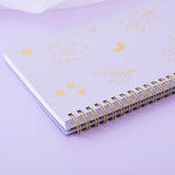 Close up on Tsuki lilac taro ringbound spine in lilac background
