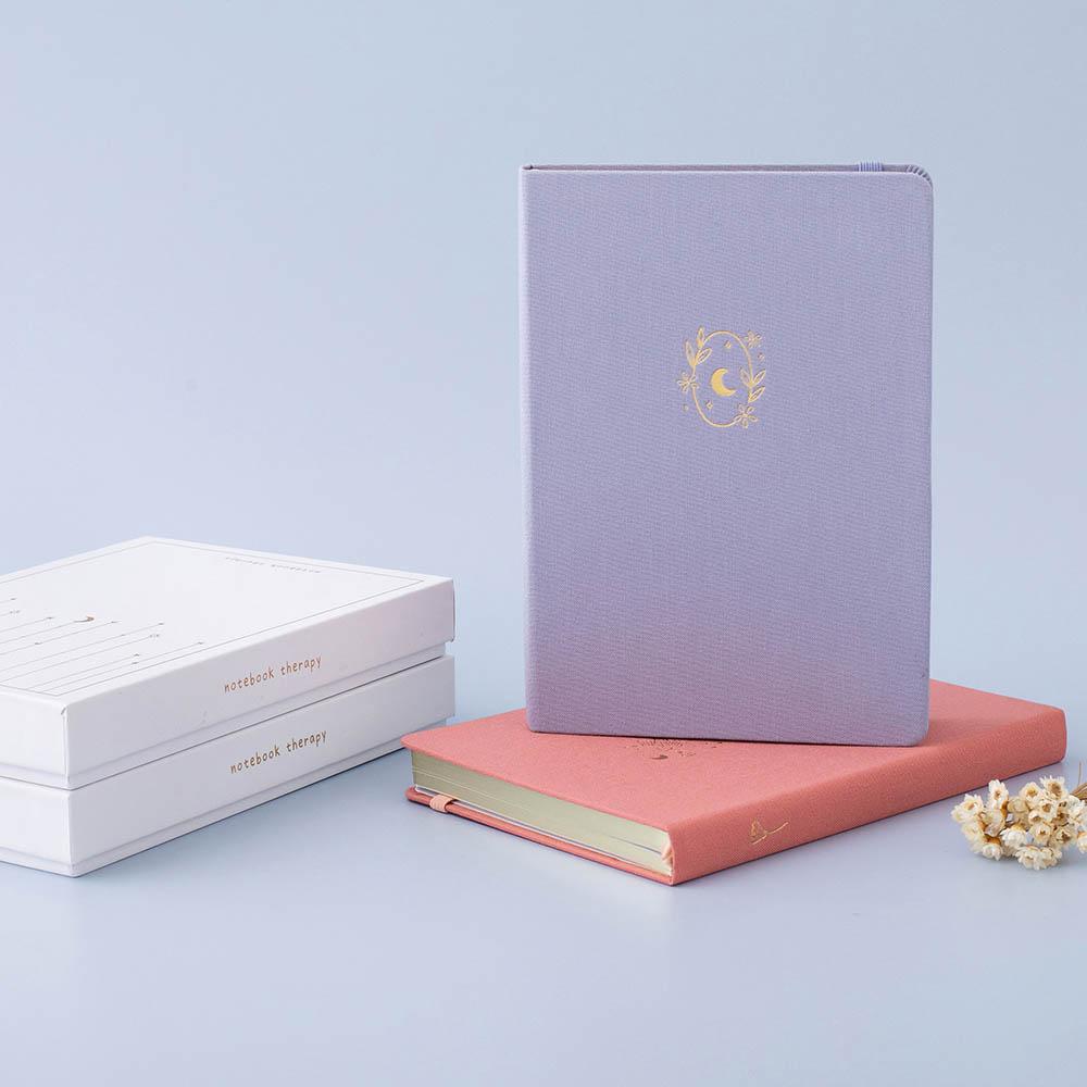 Tsuki ‘Full Bloom’ Limited Edition Bullet Journal with Tsuki ‘Suzume’ Limited Edition Notebook with luxury eco-friendly box packaging flowers on lilac background