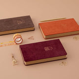 Tsuki Kraft Paper Limited Edition Bullet Journal in Kitsune and Kinoko and Nara with free bookmark gifts and Tsuki ‘Maple Dreams’ Washi Tapes with gold pen and dried flowers on beige background