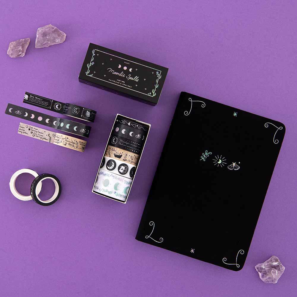 Tsuki ‘Moonlit Spell’ Limited Edition Holographic Bullet Journal with Tsuki ‘Moonlit Spell’ Washi Tape Set with amethyst stones on purple background  Edit alt text