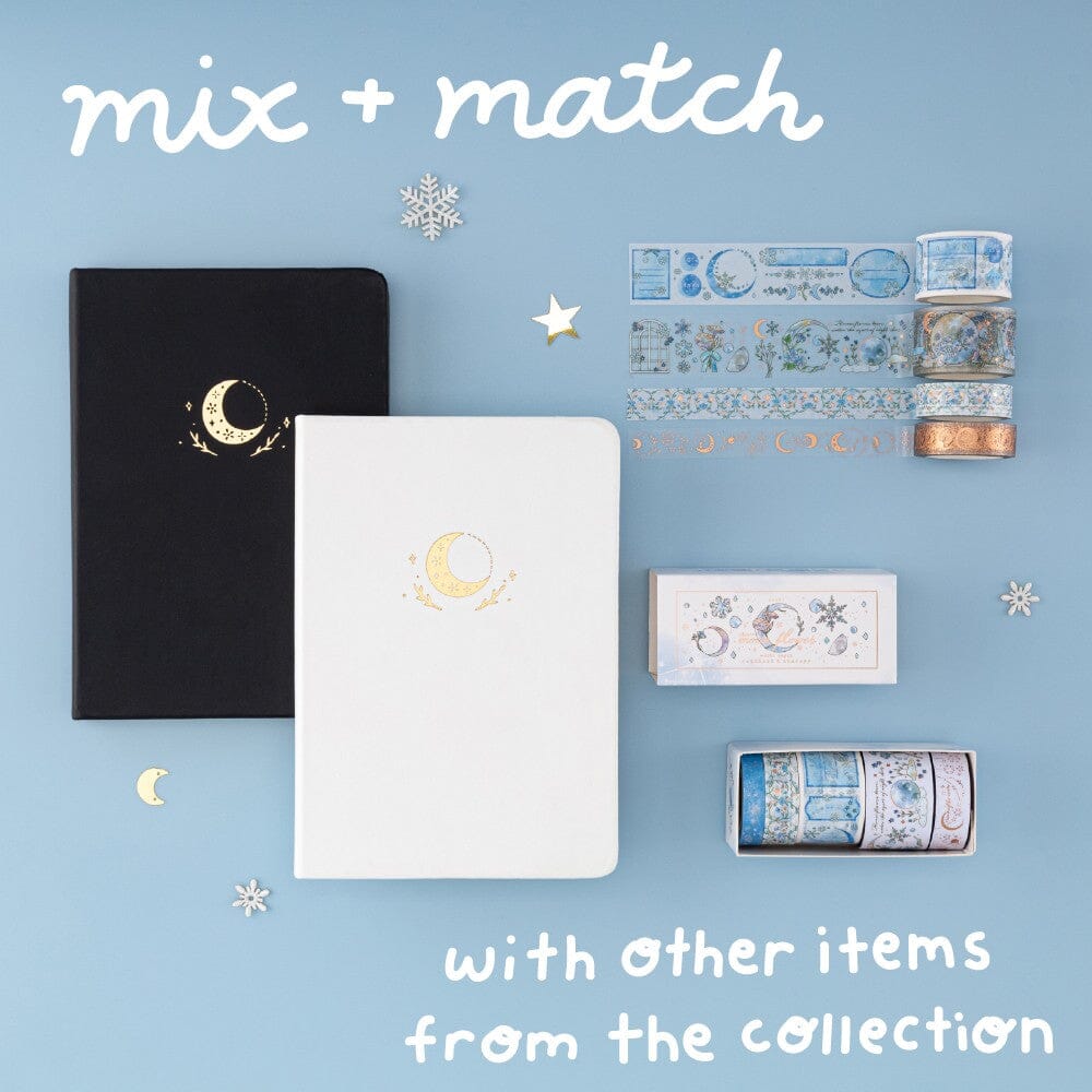Flatlay of Tsuki Moonflower notebook in black and white and winter moonflower washi tape set with text “Mix and match with other items from collection”