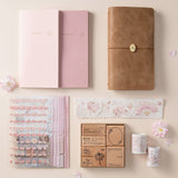 Flatlay of Hinoki into the blossom mixed insert + sticker set