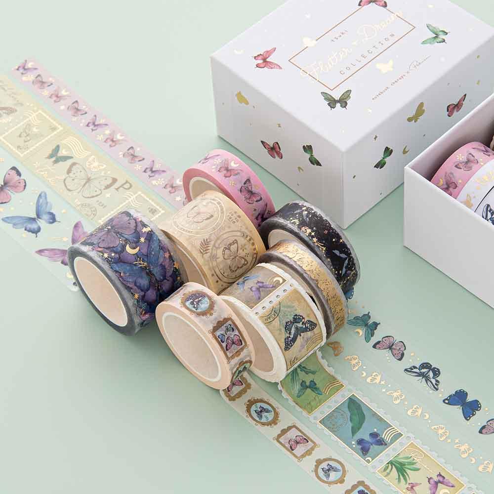 Close up of Tsuki ‘Flutter + Dream’ Washi Tape Set by Notebook Therapy x Pelinkan rolled out on mint background