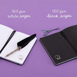 Tsuki ‘Moonlit Spell’ Limited Edition Holographic Bullet Journal with 160GSM white pages or 150GSM black paper with free bookmark gift with black feather quill and lavender sprigs on purple background