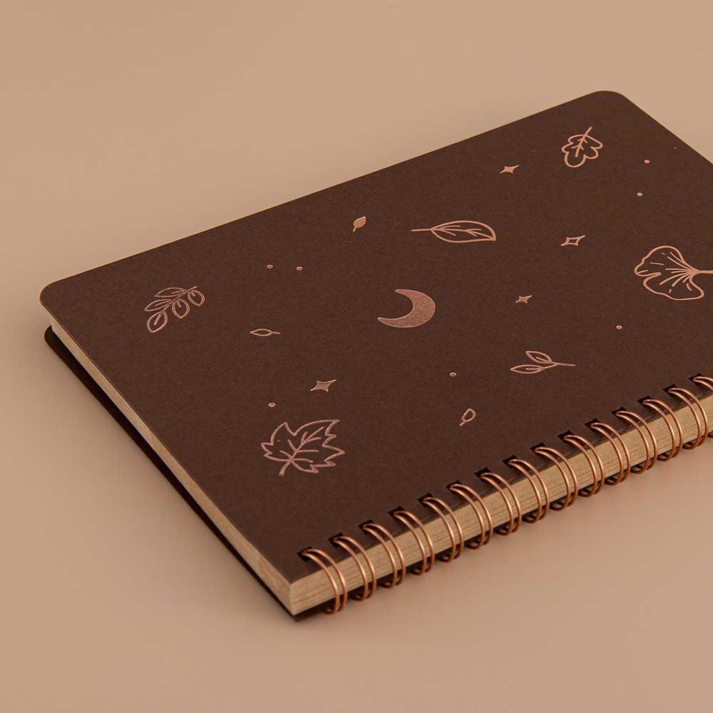 Close up of Tsuki ‘Maple Dreams’ Kraft Paper Ringbound Bullet Journal on beige background