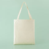 Back of Tsuki ‘Flutter + Dream’ Tote Bag by Notebook Therapy x Pelinkan in mint background