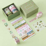 Close up of Tsuki ‘Matcha Ichigo’ Washi Tape Set with free sticker sheets on matcha green background