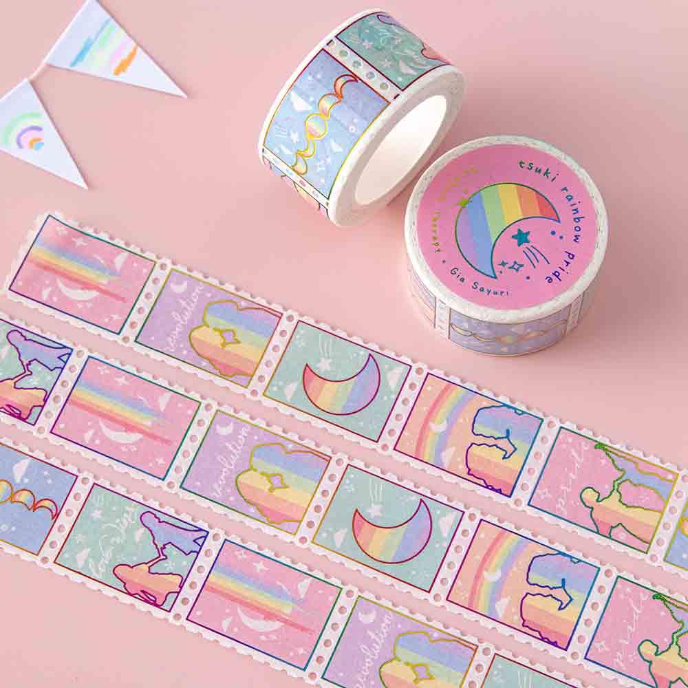 Close up of Tsuki Rainbow Pride Washi Tape with bunting on light pink background