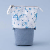 Tsuki Endless Summer Pop-Up Pencil case in Petal Blue in light blue background