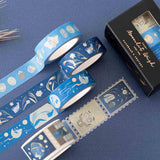 Tsuki ‘Moonlit Wish’ Washi Tape Set rolled out on dark blue background