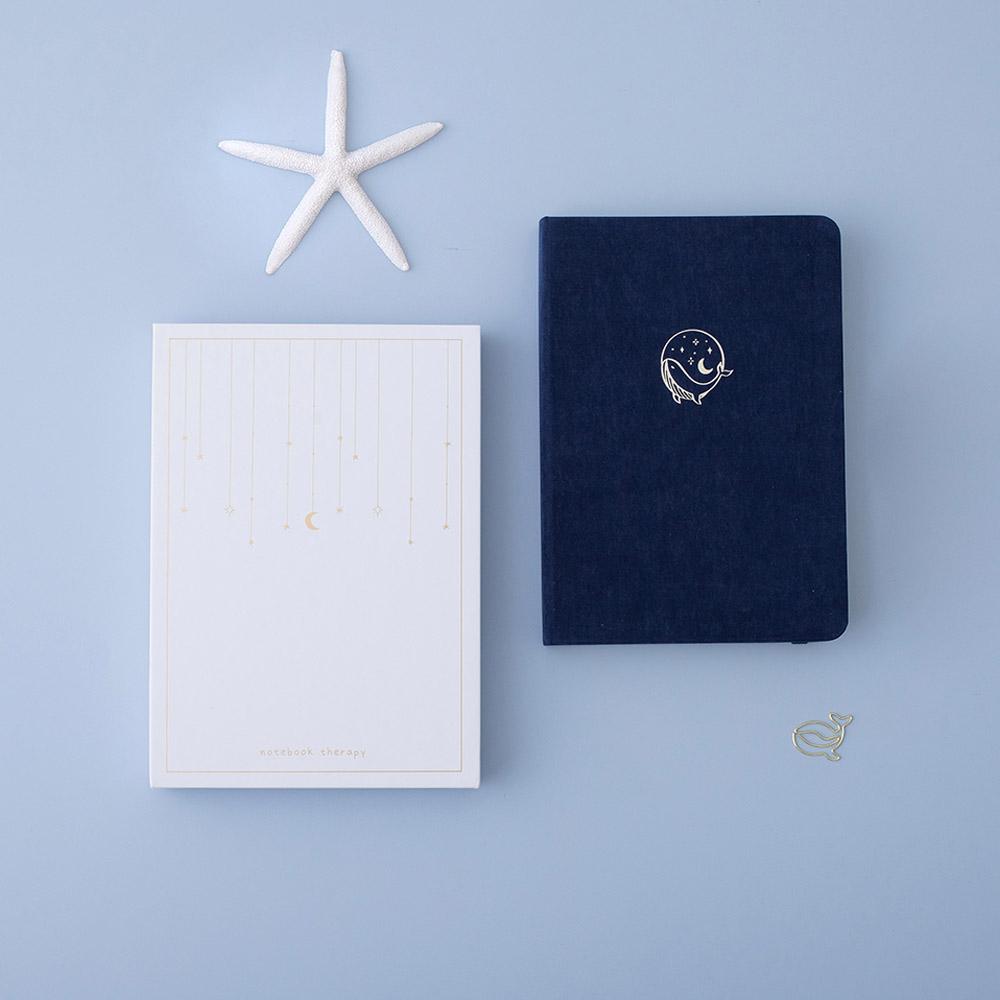 Tsuki deep blue textured vegan leather Gentle Giant luxury edition notebook with eco-friendly gift box and starfish on blue background