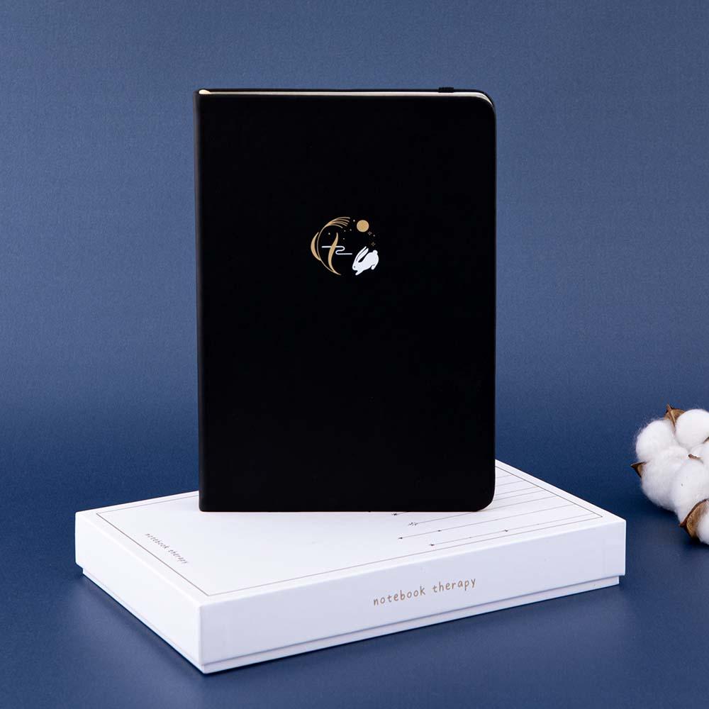 Tsuki ‘Moonlit Wish’ Limited Edition Bullet Journal with luxury gift box packaging with cotton flowers in dark blue background
