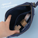 Open tsuki ‘Cloud Dreamland’ travel pouch showing a small pocket compartment with washi tapes and stamps inside