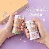 Tsuki Bunny Blush Washi Tape Set designed with Blossom Bujo held in hands over Tsuki Honey Butter ‘Bunny Blush’ Limited Edition Bullet Journal on lilac background