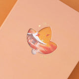 Close up of the illustrated cover on the Tsuki Four Seasons: Autumn Collector’s Edition 2022 Bullet Journal