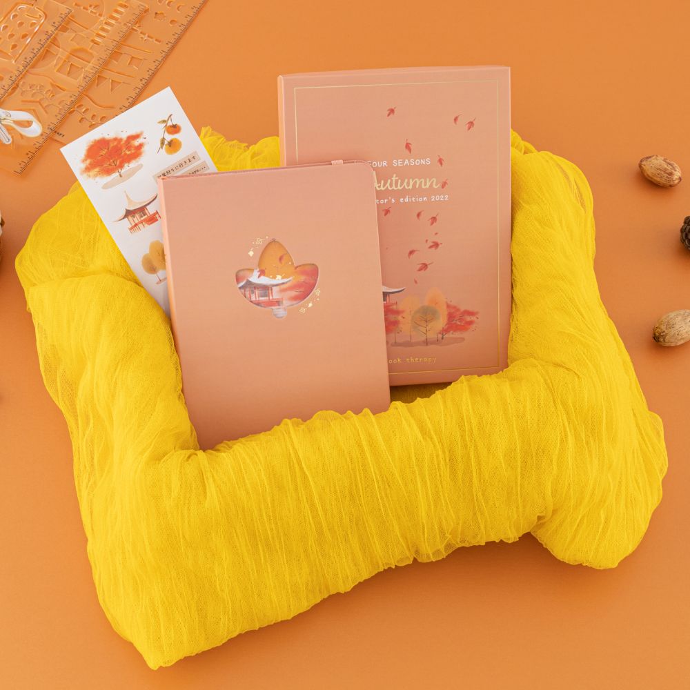 Tsuki Four Seasons: Autumn Collector’s Edition 2022 Bullet Journal, the box and the stickers in a basket