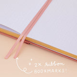 Close up of 2x ribbon bookmarks 