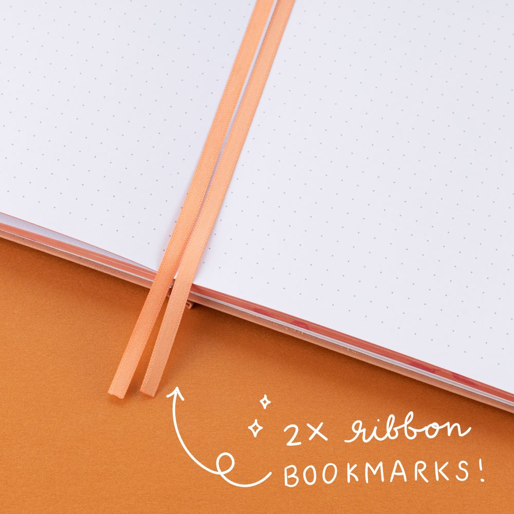 Close up of 2x ribbon bookmarks of the Tsuki Four Seasons: Autumn Collector’s Edition 2022 Bullet Journal
