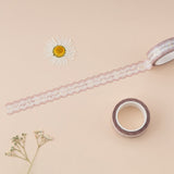 Lace die cut washi tape with gold foil details on beige background