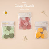Cotttage Friends wax seal sticker sets next to each other