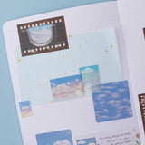 Close up of Cloud Dreamland stckers and paper on bullet journal spread