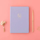 Tsuki ‘Full Bloom’ Limited Edition Bullet Journal with flowers and free gift on red background